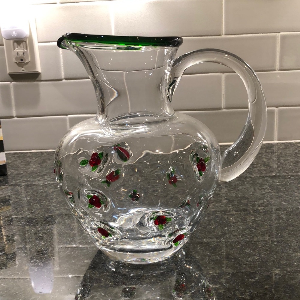 Mackenzie-Childs pitcher embossed with flowers.